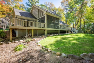Discover easy mountain living at 242 Club Colony, a beautifully on Lake Toxaway Country Club in North Carolina - for sale on GolfHomes.com, golf home, golf lot