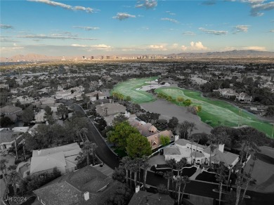 Nestled on the 10th hole of the prestigious Canyon Gate golf on Canyon Gate Country Club in Nevada - for sale on GolfHomes.com, golf home, golf lot