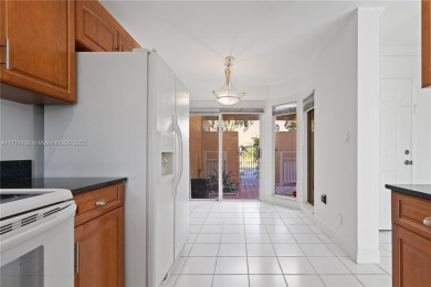 Welcome to this inviting 3-bedroom, 2.5-bathroom townhouse in on Jim McLean Signature Course in Florida - for sale on GolfHomes.com, golf home, golf lot