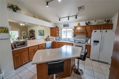 LOVELY 3-BED, 2-BATH HOME IN A GREAT SPOT!! This well-kept on Cerbat Cliffs Golf Course in Arizona - for sale on GolfHomes.com, golf home, golf lot
