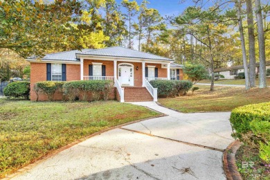 Charming 3-Bedroom, 2-Bath Home in Lake Forest. This inviting on Lake Forest Yacht and Country Club in Alabama - for sale on GolfHomes.com, golf home, golf lot