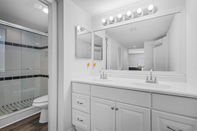 Beautifully updated 2 bedroom condo with a peak of ocean views on Ocean Village Golf Course in Florida - for sale on GolfHomes.com, golf home, golf lot