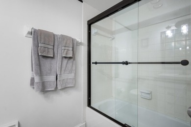 Beautifully updated 2 bedroom condo with a peak of ocean views on Ocean Village Golf Course in Florida - for sale on GolfHomes.com, golf home, golf lot