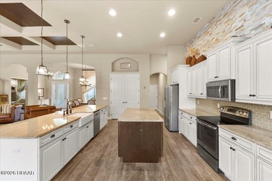 Luxury Resort-style living meets timeless elegance in this on Venetian Bay Golf Course in Florida - for sale on GolfHomes.com, golf home, golf lot