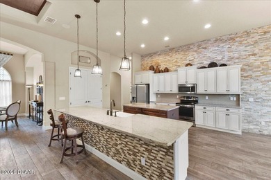 Luxury Resort-style living meets timeless elegance in this on Venetian Bay Golf Course in Florida - for sale on GolfHomes.com, golf home, golf lot