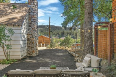 Prepare to fall in love with this dreamy mountain retreat on Big Bear Mountain Ski and Golf Resort in California - for sale on GolfHomes.com, golf home, golf lot