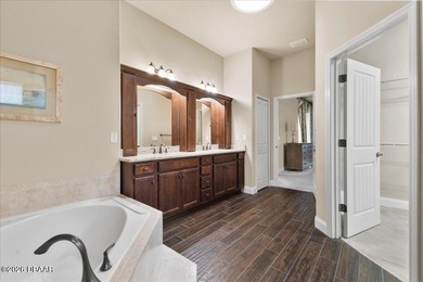 Luxury Resort-style living meets timeless elegance in this on Venetian Bay Golf Course in Florida - for sale on GolfHomes.com, golf home, golf lot