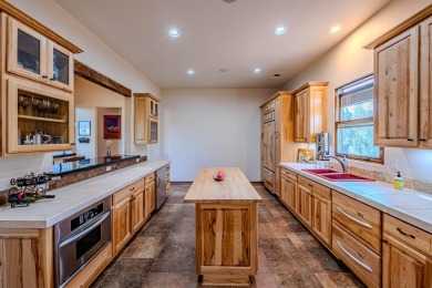 Welcome to 6 Storyteller Ct, a stunning mountain retreat nestled on Paa-Ko Ridge Golf Club  in New Mexico - for sale on GolfHomes.com, golf home, golf lot