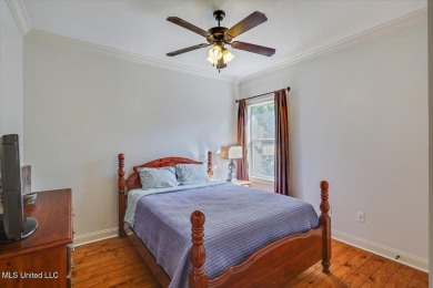 Located on the prestigious Castlewoods golf course, this on Castlewoods Golf Club in Mississippi - for sale on GolfHomes.com, golf home, golf lot
