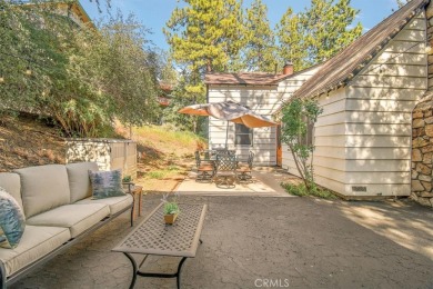 Prepare to fall in love with this dreamy mountain retreat on Big Bear Mountain Ski and Golf Resort in California - for sale on GolfHomes.com, golf home, golf lot