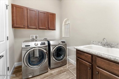 Luxury Resort-style living meets timeless elegance in this on Venetian Bay Golf Course in Florida - for sale on GolfHomes.com, golf home, golf lot