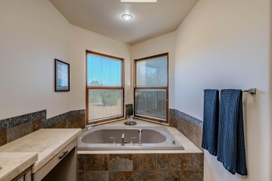 Welcome to 6 Storyteller Ct, a stunning mountain retreat nestled on Paa-Ko Ridge Golf Club  in New Mexico - for sale on GolfHomes.com, golf home, golf lot