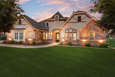 This stunning custom-built, single-story 4-bedroom, 3-bath on The Golf Club at Resort Eagle Mountain Lake in Texas - for sale on GolfHomes.com, golf home, golf lot