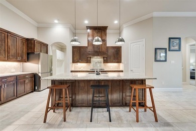 This stunning custom-built, single-story 4-bedroom, 3-bath on The Golf Club at Resort Eagle Mountain Lake in Texas - for sale on GolfHomes.com, golf home, golf lot