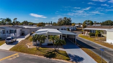 Welcome to this beautifully updated 2-bedroom, 2-bath home on Kings Gate Golf Club in Florida - for sale on GolfHomes.com, golf home, golf lot