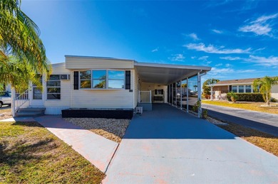 Welcome to this beautifully updated 2-bedroom, 2-bath home on Kings Gate Golf Club in Florida - for sale on GolfHomes.com, golf home, golf lot