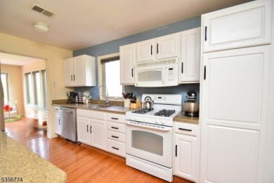 This 3-bedroom, 3-bath end-unit townhome isn't just a place to on Minerals Golf Club in New Jersey - for sale on GolfHomes.com, golf home, golf lot