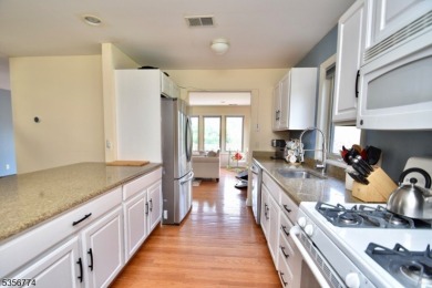 This 3-bedroom, 3-bath end-unit townhome isn't just a place to on Minerals Golf Club in New Jersey - for sale on GolfHomes.com, golf home, golf lot