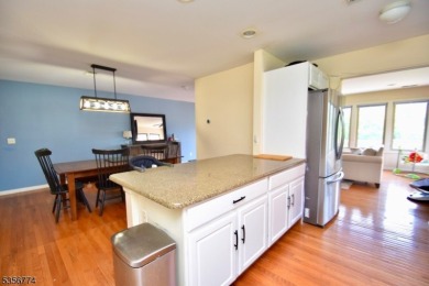 This 3-bedroom, 3-bath end-unit townhome isn't just a place to on Minerals Golf Club in New Jersey - for sale on GolfHomes.com, golf home, golf lot