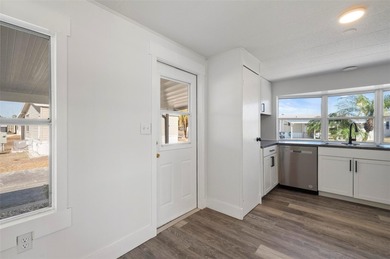 Welcome to this beautifully updated 2-bedroom, 2-bath home on Kings Gate Golf Club in Florida - for sale on GolfHomes.com, golf home, golf lot