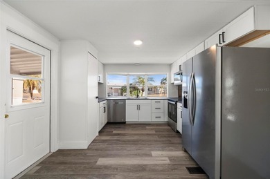 Welcome to this beautifully updated 2-bedroom, 2-bath home on Kings Gate Golf Club in Florida - for sale on GolfHomes.com, golf home, golf lot