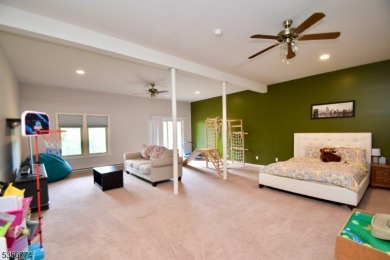 This 3-bedroom, 3-bath end-unit townhome isn't just a place to on Minerals Golf Club in New Jersey - for sale on GolfHomes.com, golf home, golf lot