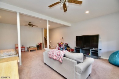This 3-bedroom, 3-bath end-unit townhome isn't just a place to on Minerals Golf Club in New Jersey - for sale on GolfHomes.com, golf home, golf lot