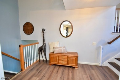 This 3-bedroom, 3-bath end-unit townhome isn't just a place to on Minerals Golf Club in New Jersey - for sale on GolfHomes.com, golf home, golf lot