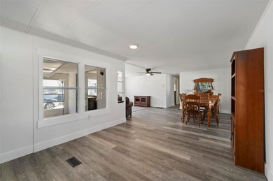 Welcome to this beautifully updated 2-bedroom, 2-bath home on Kings Gate Golf Club in Florida - for sale on GolfHomes.com, golf home, golf lot