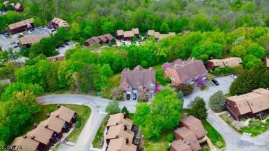 This 3-bedroom, 3-bath end-unit townhome isn't just a place to on Minerals Golf Club in New Jersey - for sale on GolfHomes.com, golf home, golf lot