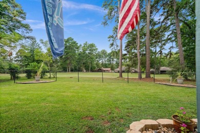 This spacious home sitting on the 16th fairway in Holly Lake on Holly Lake Ranch Golf Club in Texas - for sale on GolfHomes.com, golf home, golf lot