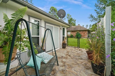 This spacious home sitting on the 16th fairway in Holly Lake on Holly Lake Ranch Golf Club in Texas - for sale on GolfHomes.com, golf home, golf lot