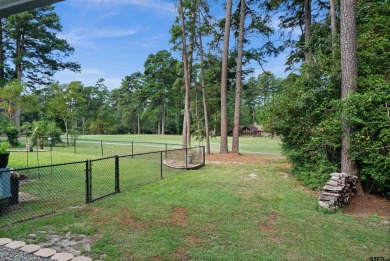 This spacious home sitting on the 16th fairway in Holly Lake on Holly Lake Ranch Golf Club in Texas - for sale on GolfHomes.com, golf home, golf lot