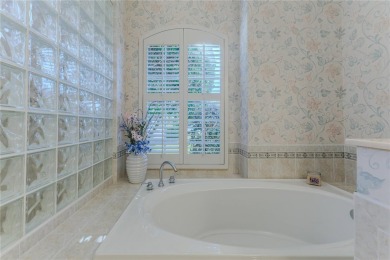 Welcome to this stunning 3-bedroom + office, 3-bathroom, pool on Glen Lakes Country Club in Florida - for sale on GolfHomes.com, golf home, golf lot
