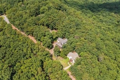 Come home to this mountain retreat located in the sought-after on The Highlands Course at Lake Arrowhead in Georgia - for sale on GolfHomes.com, golf home, golf lot