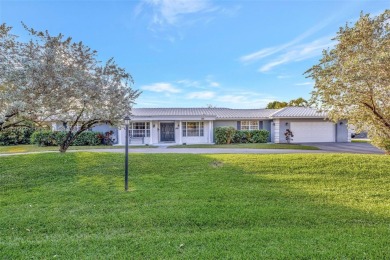 5-bed, 3-bath home on over 19,000 sq. ft. of land, offering on Plantation Preserve Golf Course in Florida - for sale on GolfHomes.com, golf home, golf lot