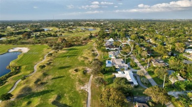 5-bed, 3-bath home on over 19,000 sq. ft. of land, offering on Plantation Preserve Golf Course in Florida - for sale on GolfHomes.com, golf home, golf lot