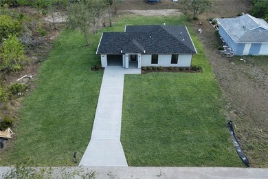 Welcome to this beautifully designed brand-new construction home on Burnt Store Golf Club in Florida - for sale on GolfHomes.com, golf home, golf lot