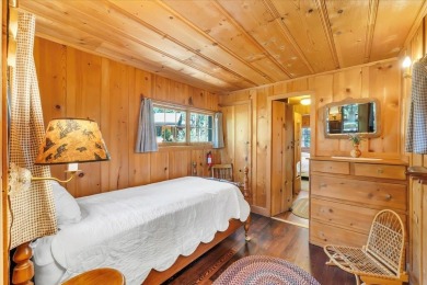 Welcome to Haleiwa! This fully furnished 1928 original Tahoe on Old Brockway Golf Club in California - for sale on GolfHomes.com, golf home, golf lot