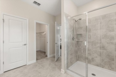 Welcome to this exceptional 5 bedroom, 3 bathroom residence on ChampionsGate Golf Resort in Florida - for sale on GolfHomes.com, golf home, golf lot
