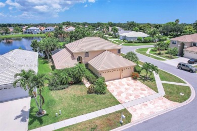 Corner Lot! Beautiful Pool and Lakefront View. Porcelain and on Winston Trails Golf Course in Florida - for sale on GolfHomes.com, golf home, golf lot