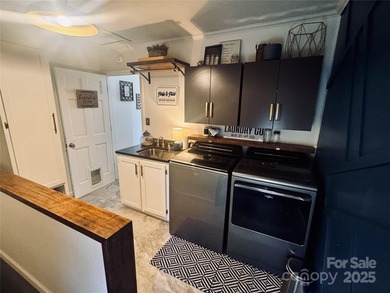 Luxury golf-course living awaits at this custom renovated on Brushy Mountain Golf Course in North Carolina - for sale on GolfHomes.com, golf home, golf lot