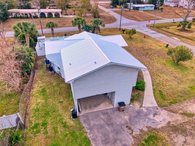 NEW PRICE + NEW METAL ROOF! Pool home just minutes from the on Saint Josephs Bay Country Club in Florida - for sale on GolfHomes.com, golf home, golf lot