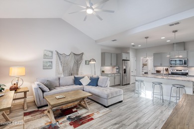 Thoughtfully designed and meticulously maintained, this Camellia on LPGA International Golf Course in Florida - for sale on GolfHomes.com, golf home, golf lot