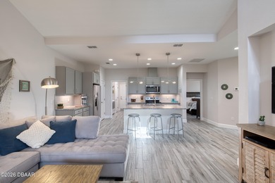 Thoughtfully designed and meticulously maintained, this Camellia on LPGA International Golf Course in Florida - for sale on GolfHomes.com, golf home, golf lot