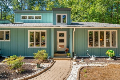 Discover this adorable 3-bedroom, 2-bath cottage tucked away on on Carolina Trace Country Club in North Carolina - for sale on GolfHomes.com, golf home, golf lot