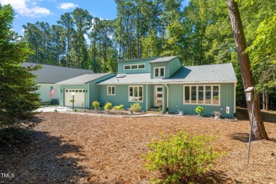Discover this adorable 3-bedroom, 2-bath cottage tucked away on on Carolina Trace Country Club in North Carolina - for sale on GolfHomes.com, golf home, golf lot