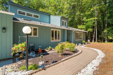 Discover this adorable 3-bedroom, 2-bath cottage tucked away on on Carolina Trace Country Club in North Carolina - for sale on GolfHomes.com, golf home, golf lot