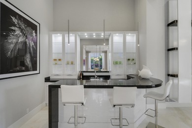 Spectacular 1-story residence by Mustapick Homes on a .39 acre on Old Palm Golf Club in Florida - for sale on GolfHomes.com, golf home, golf lot