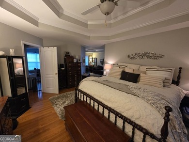 Welcome to this beautifully maintained all-brick home, ideally on Canongate At Georgia National Golf Club in Georgia - for sale on GolfHomes.com, golf home, golf lot